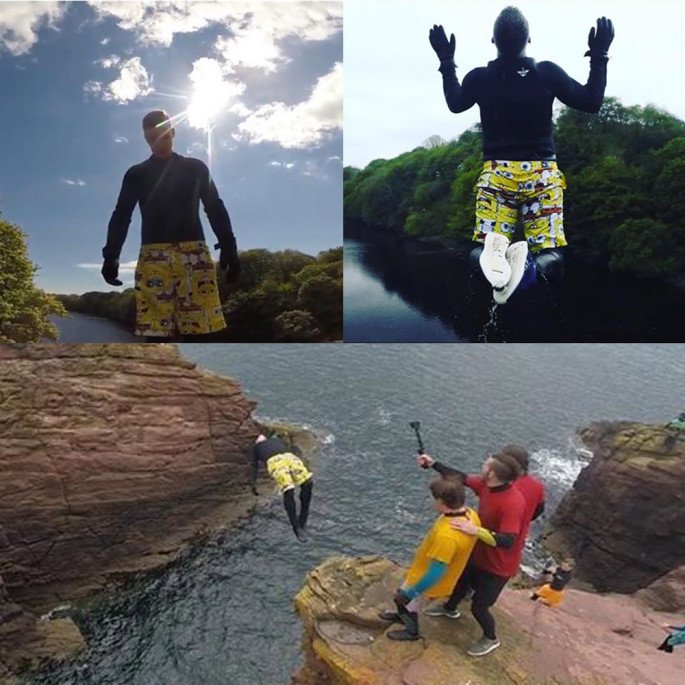 Chris Murphy cliff jumping shots in his Northern Diver gloves and wetsuit