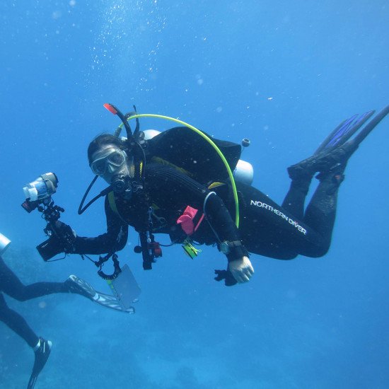 Underwater photograph of Northern Divers Delta Flex Semi-Tech Wetsuit in action