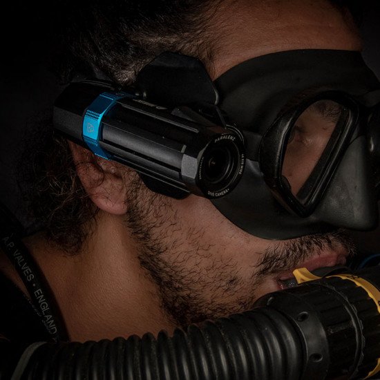 Paralenz Adjustable Mask Mount attached to a mask preparing for a dive