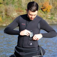 Rechargeable warm heated vest for use both on the surface and under water. 