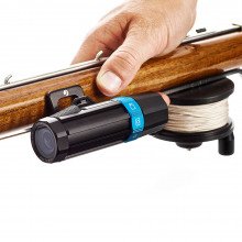 Paralenz® Speargun Mount affixed to a wooden speargun above the reel