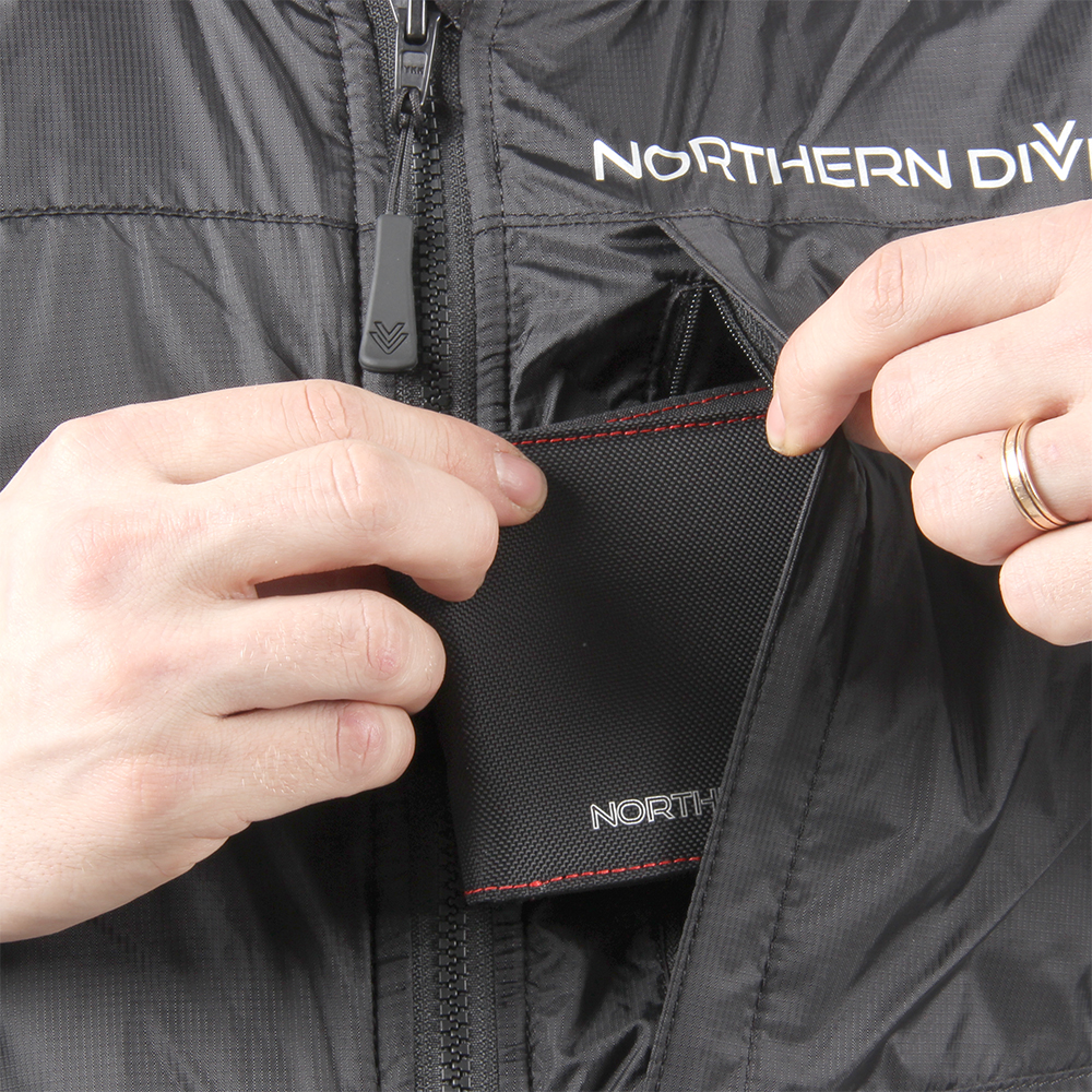 A zipped left chest pocket