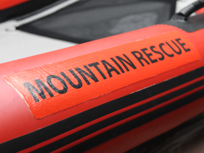 RR3 Inflatable Sled - Mountain Rescue Team custom branding